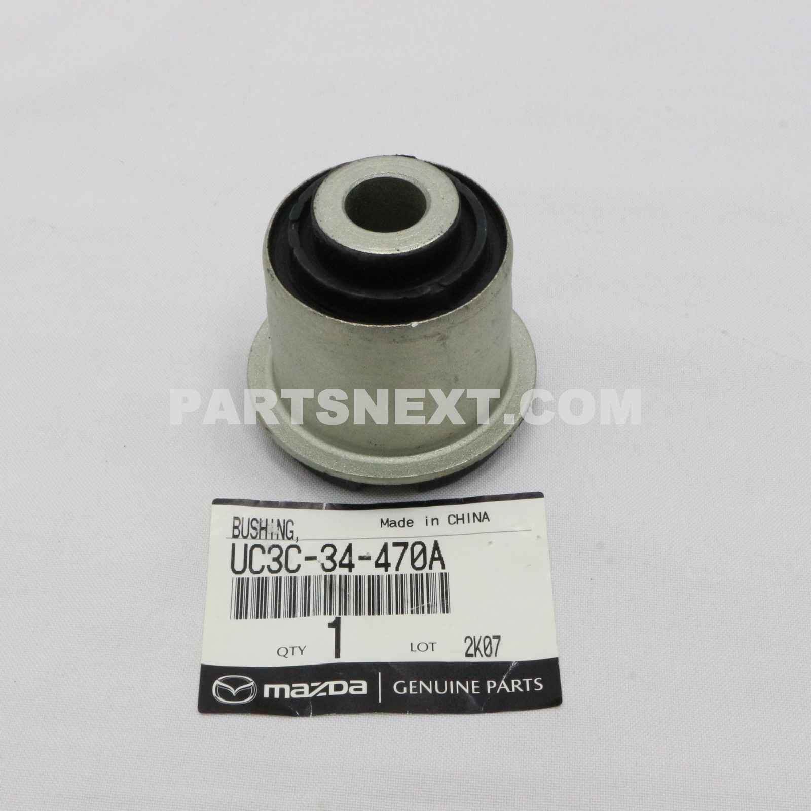 Mazda :: UC3C-34-470A BUSHING,RUBBER-FRT